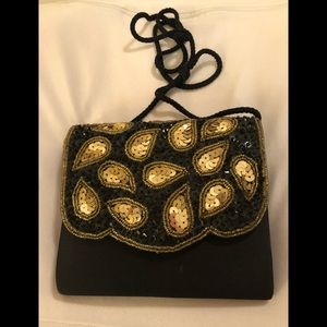 Beautiful black and gold paisley sequin handbag